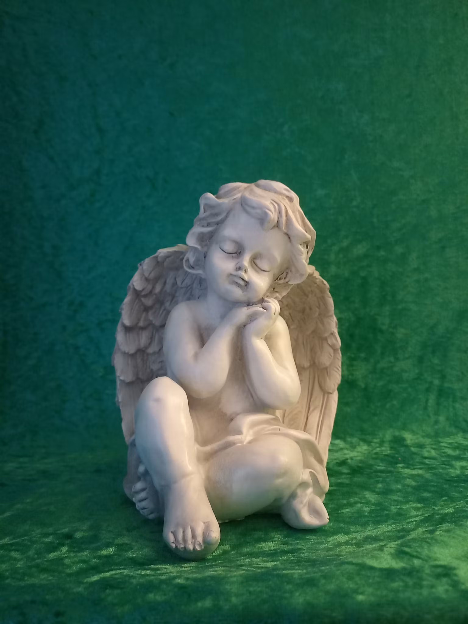 Sittande Ängel