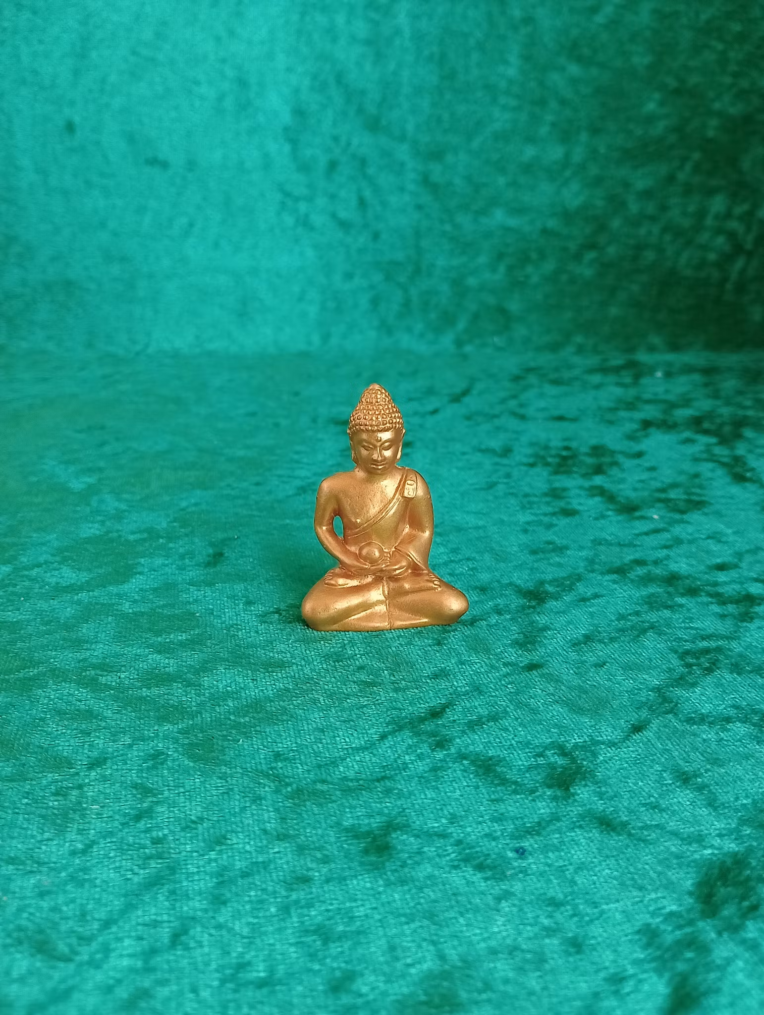 Guldig liten Buddha