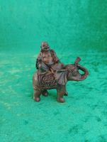 Buddha ridande på Elefant