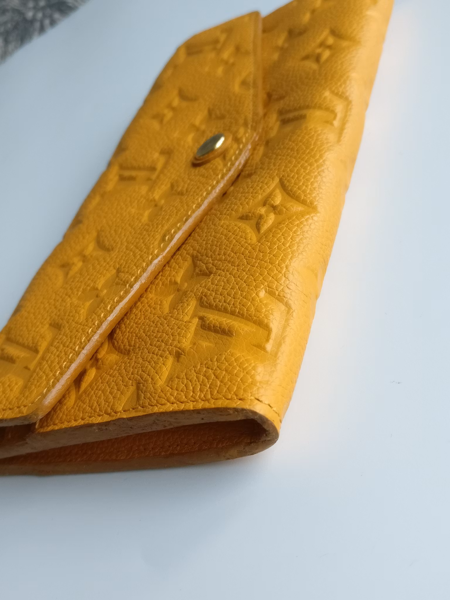 Louis Vuitton Empreinte Portefeuille Curieuse wallet