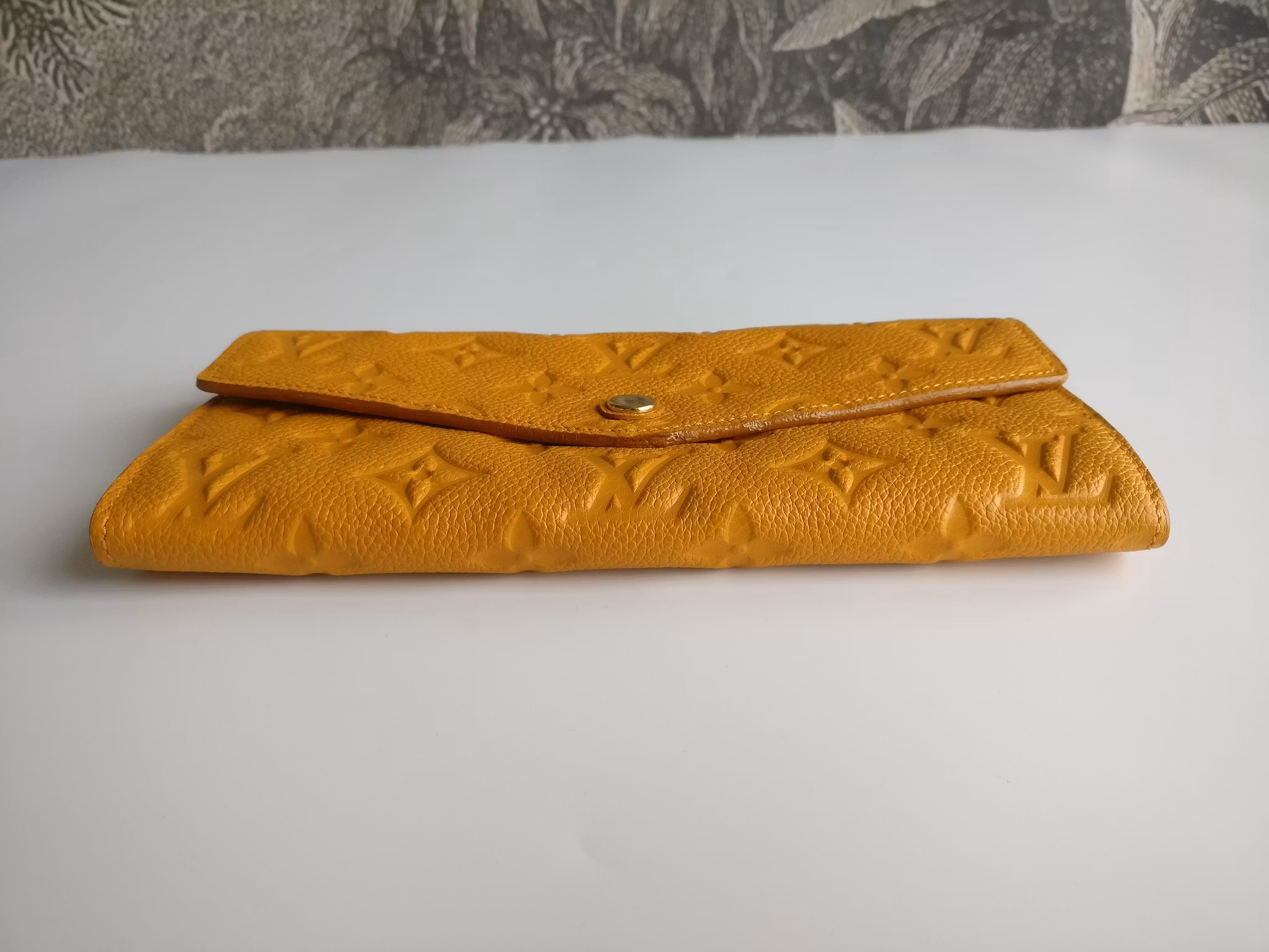 Louis Vuitton Empreinte Portefeuille Curieuse wallet