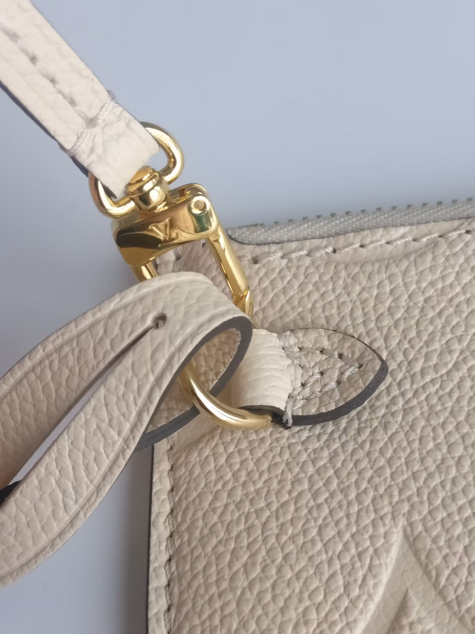 Louis Vuitton Neverfull empreinte clutch