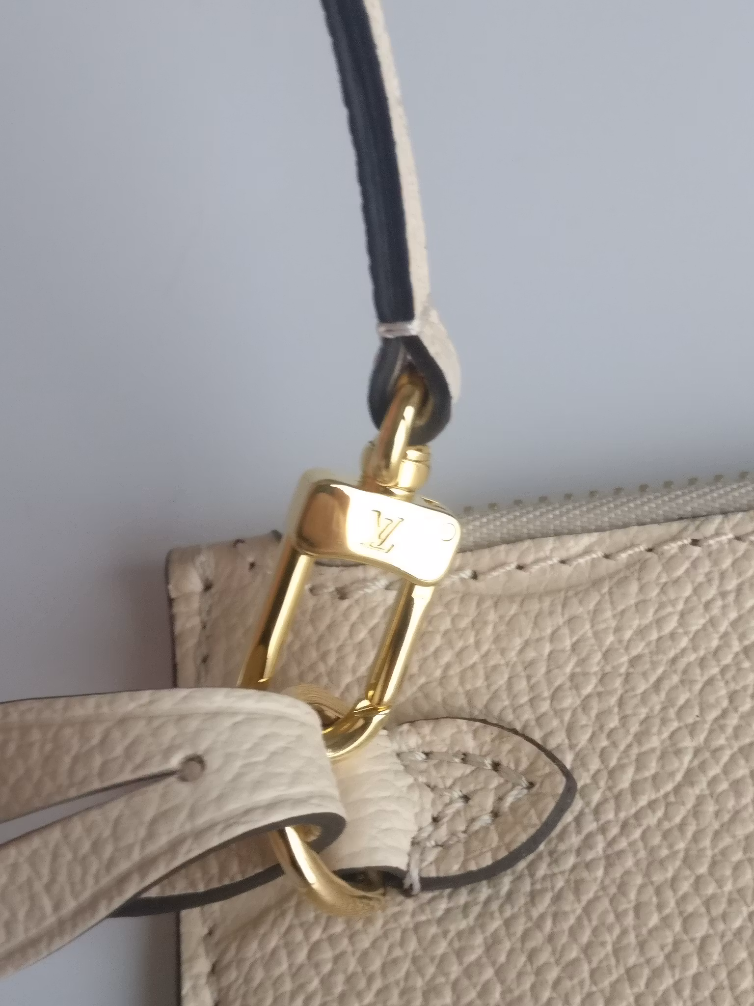 Louis Vuitton Neverfull empreinte clutch