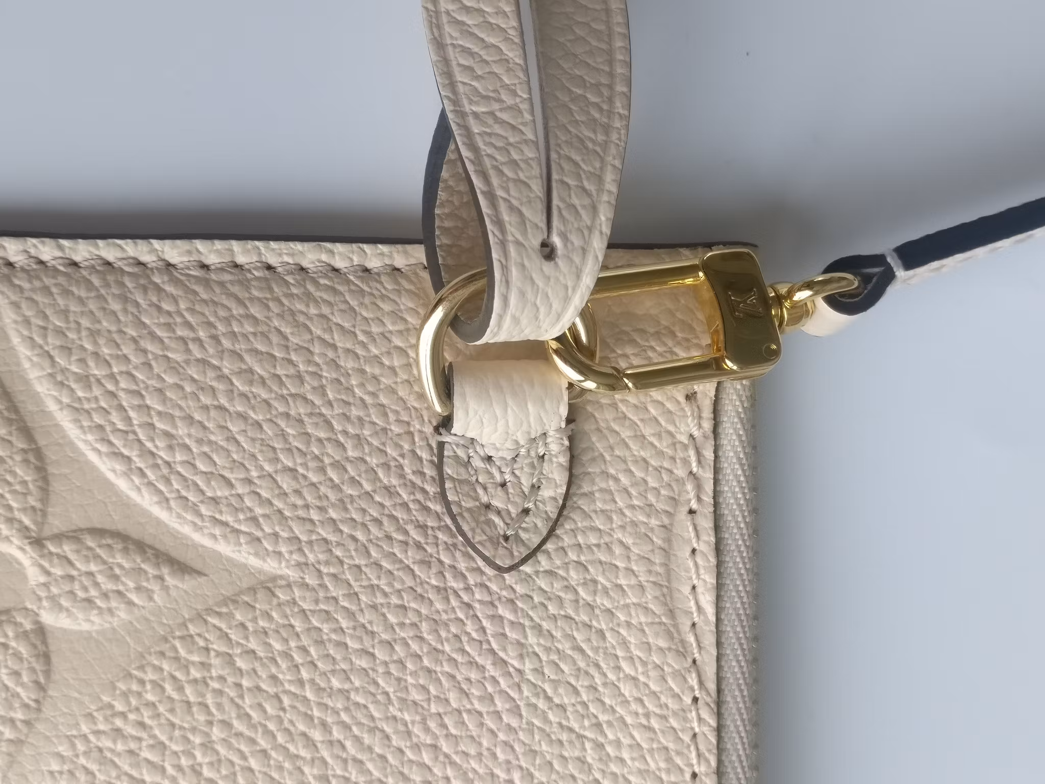 Louis Vuitton Neverfull empreinte clutch