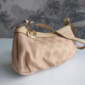 Gucci Pink GG Canvas Interlocking G Heart Pochette
