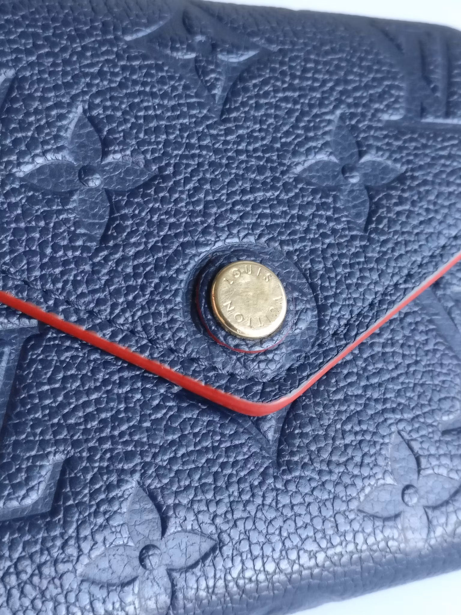 Louis Vuitton Victorine Wallet empreinte marine rouge