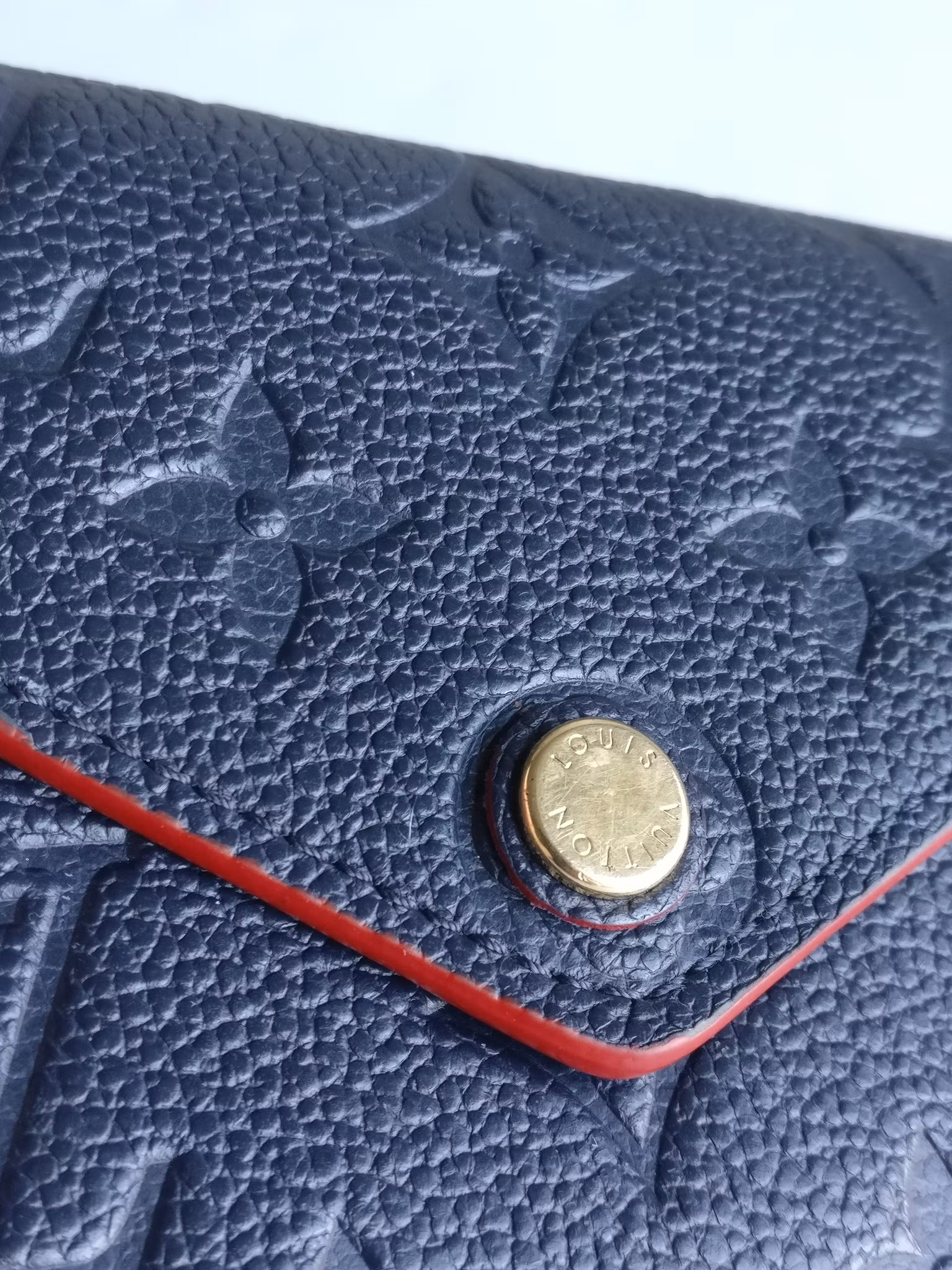 Louis Vuitton Victorine Wallet empreinte marine rouge