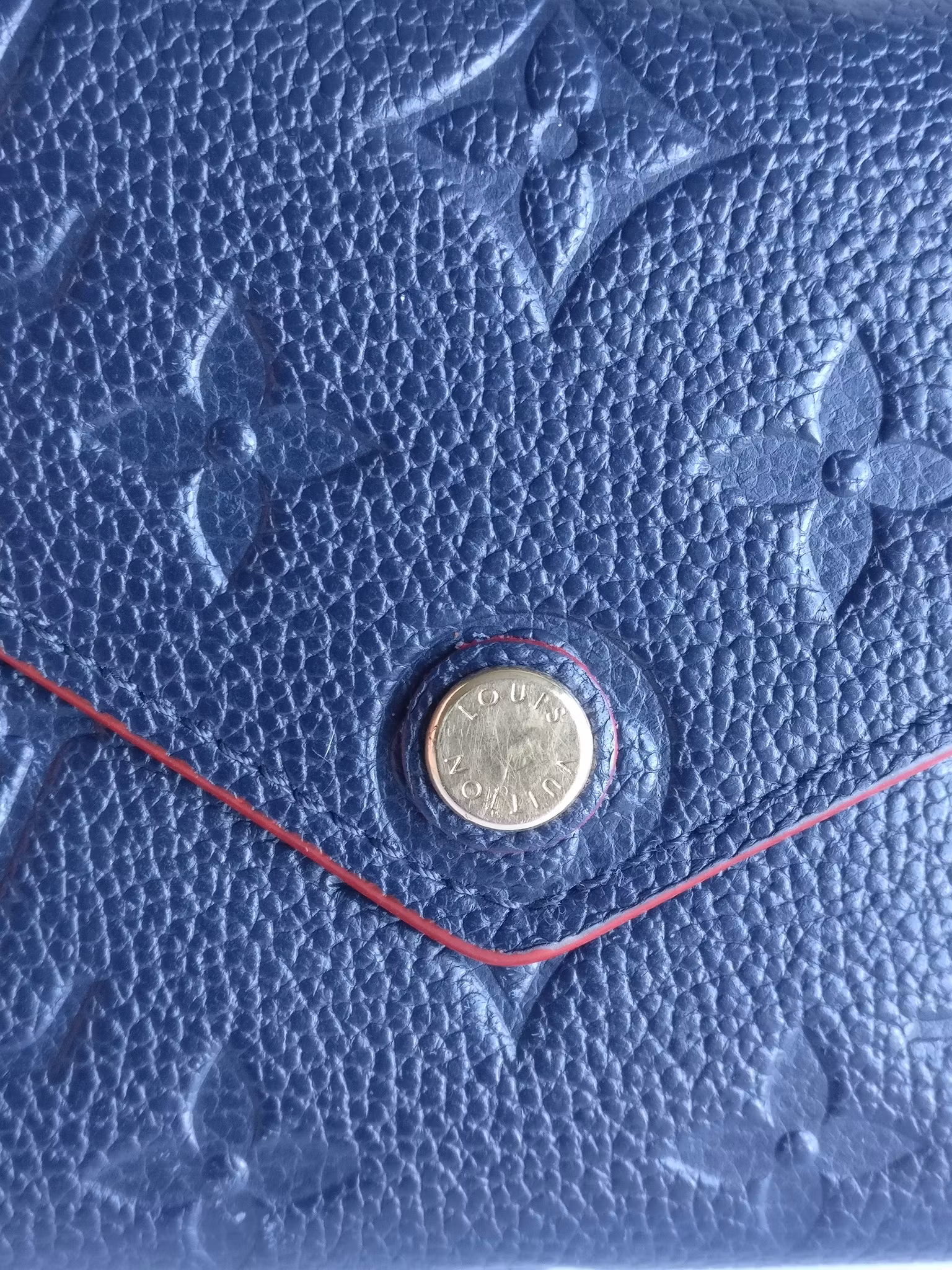 Louis Vuitton Victorine Wallet empreinte marine rouge