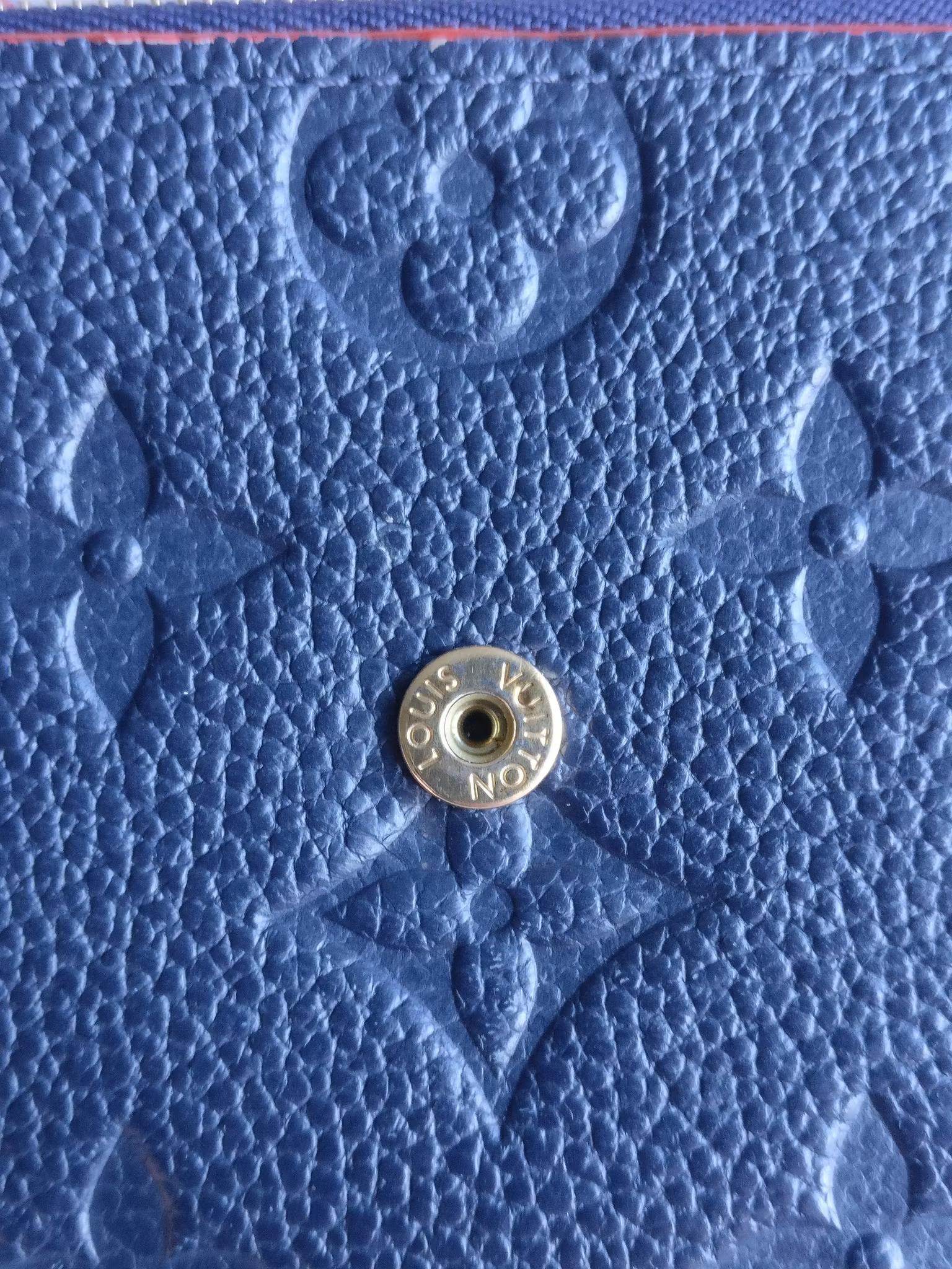 Louis Vuitton Victorine Wallet empreinte marine rouge