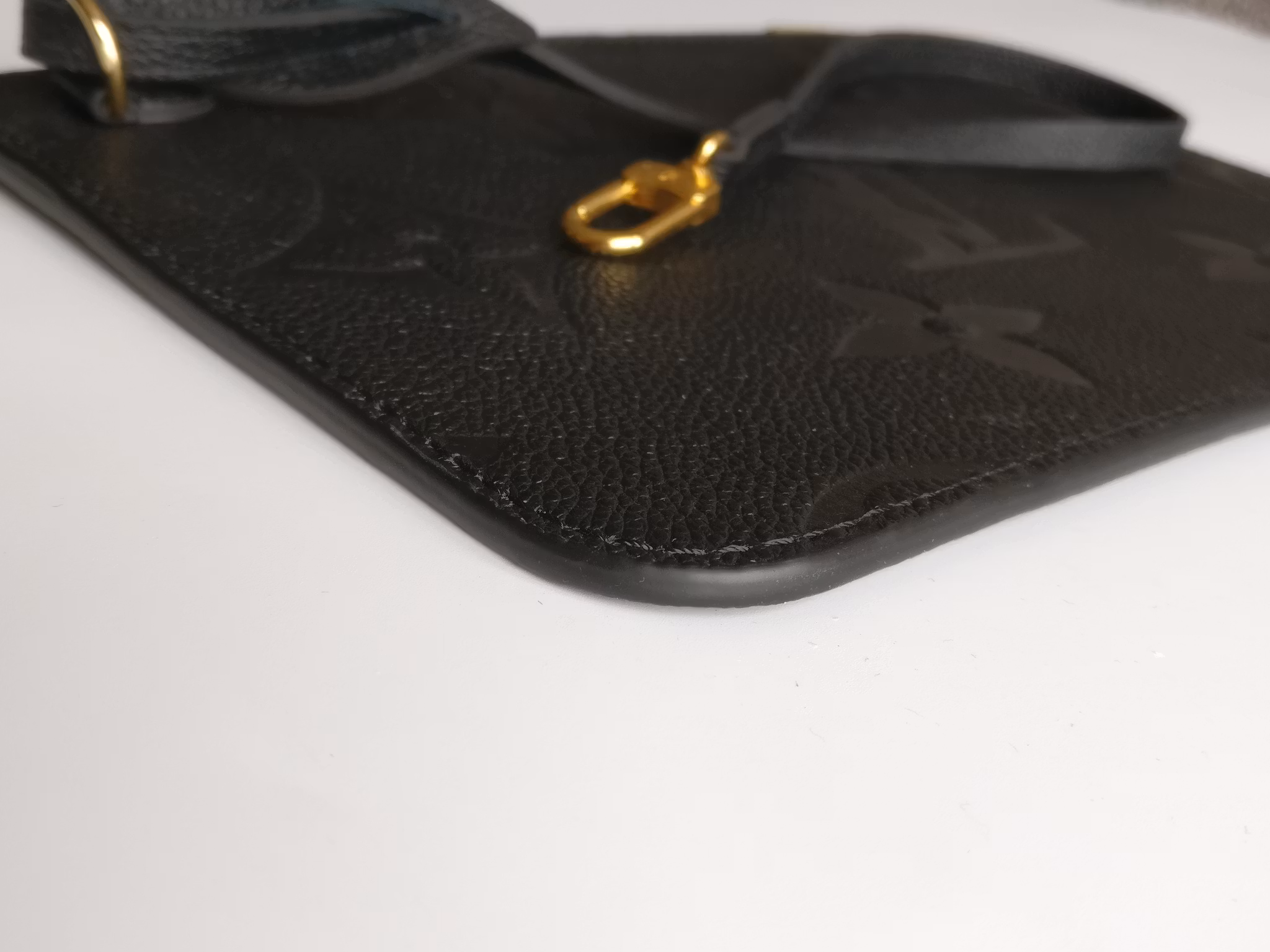 Louis Vuitton Neverfull empreinte clutch
