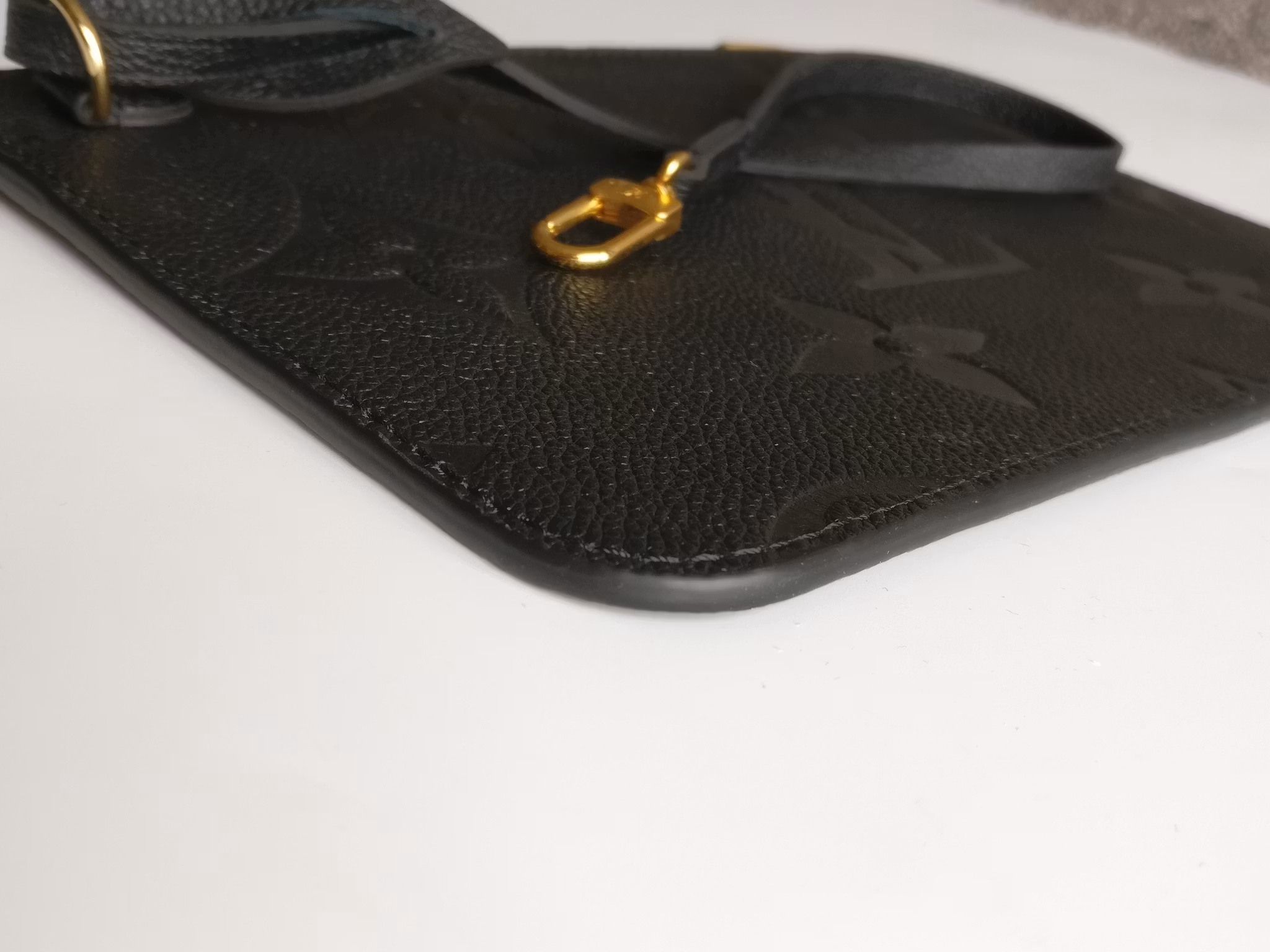 Louis Vuitton Neverfull empreinte clutch