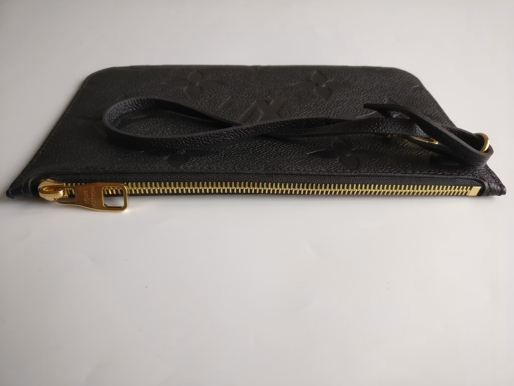 Louis Vuitton Neverfull empreinte clutch