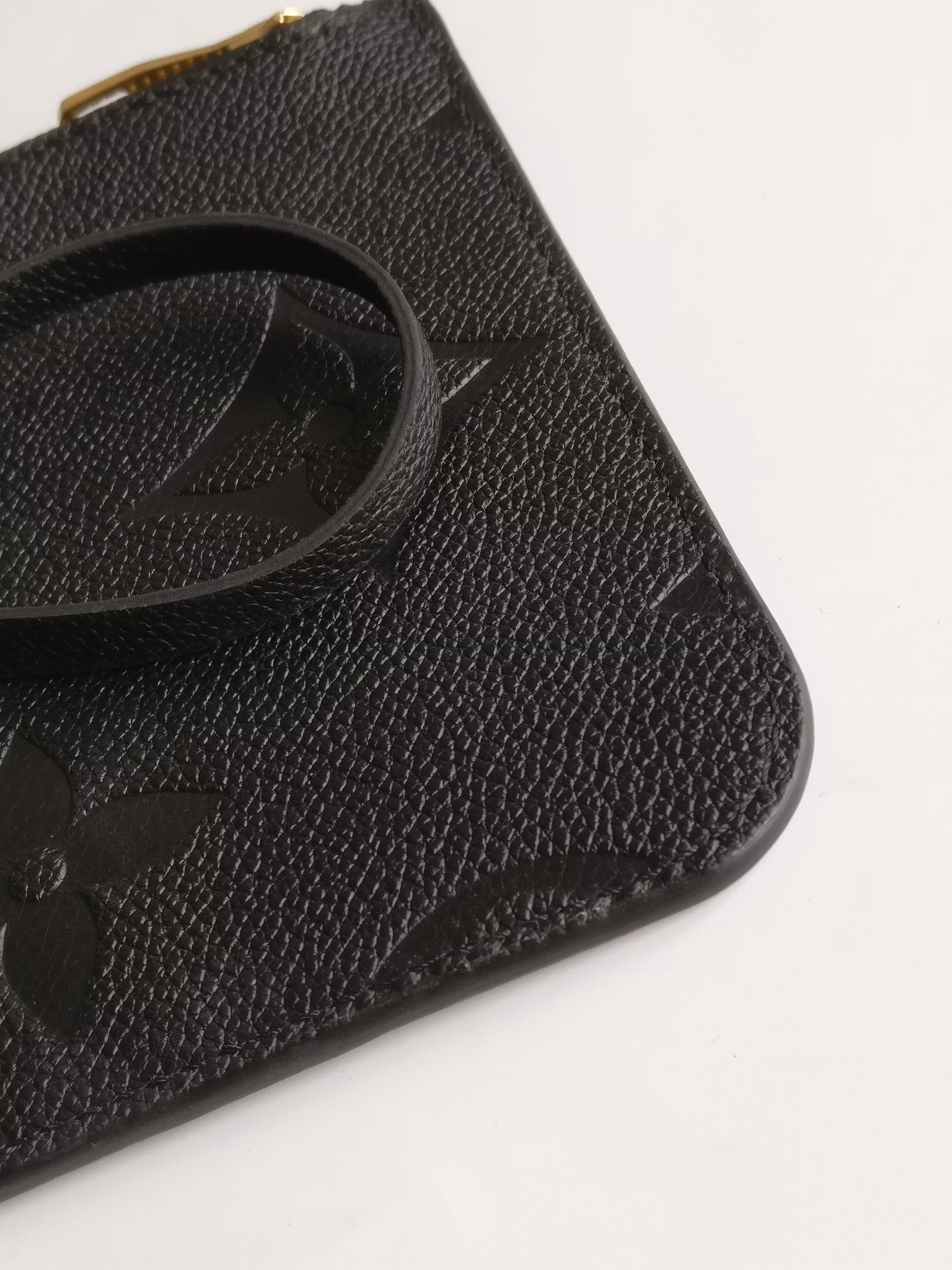 Louis Vuitton Neverfull empreinte clutch