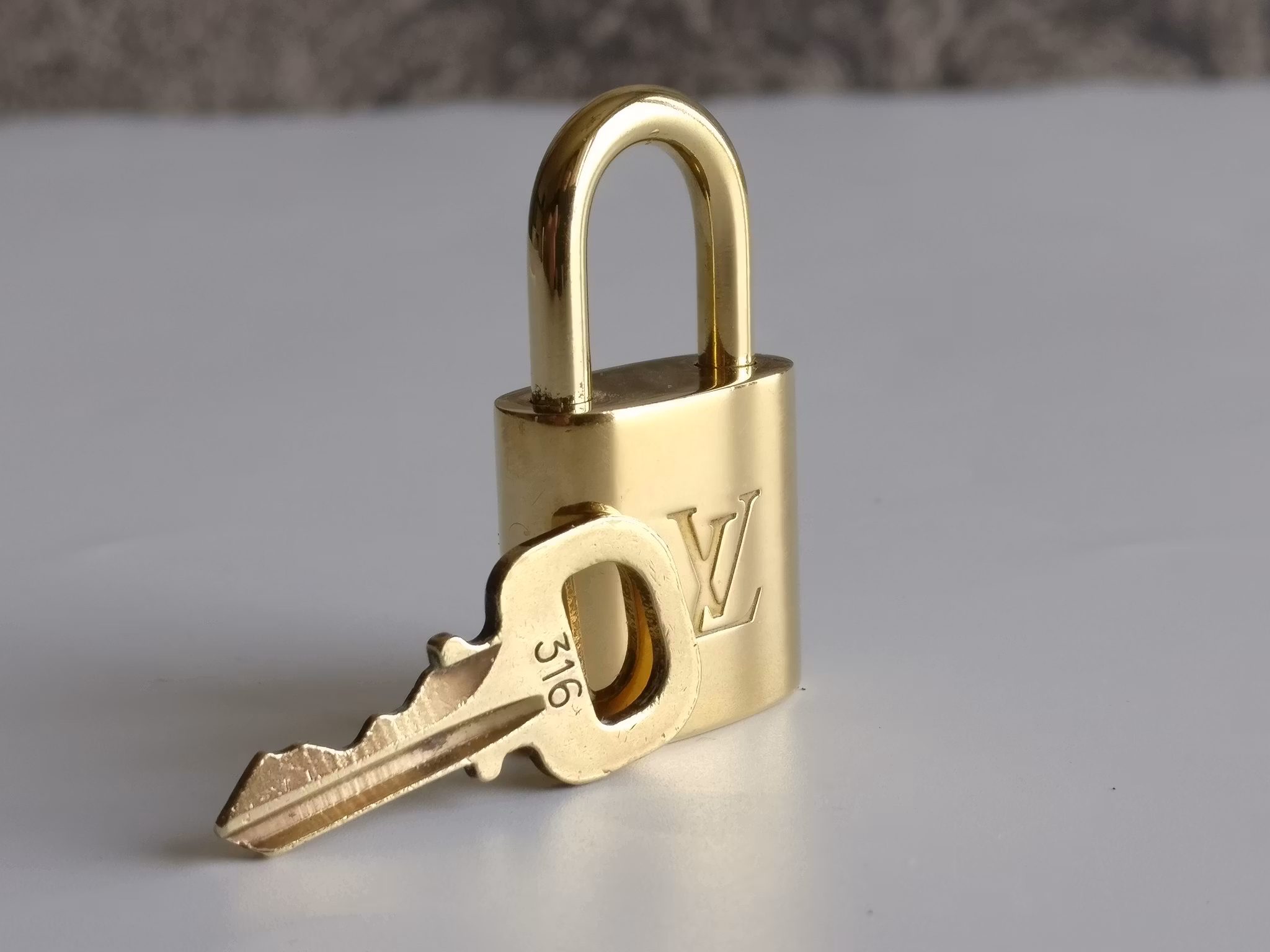 Louis Vuitton Padlock and key 316