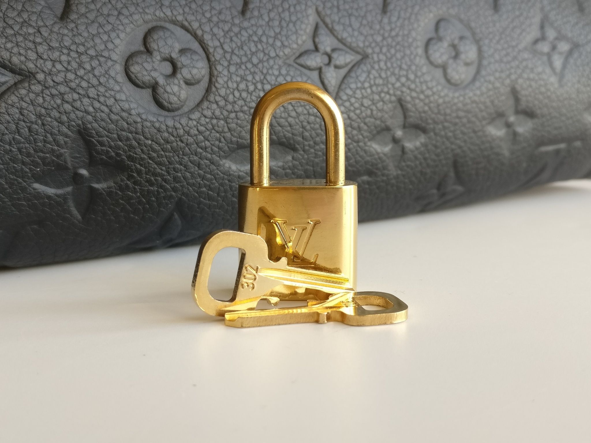 Louis Vuitton Lumineuse PM monogram empreinte