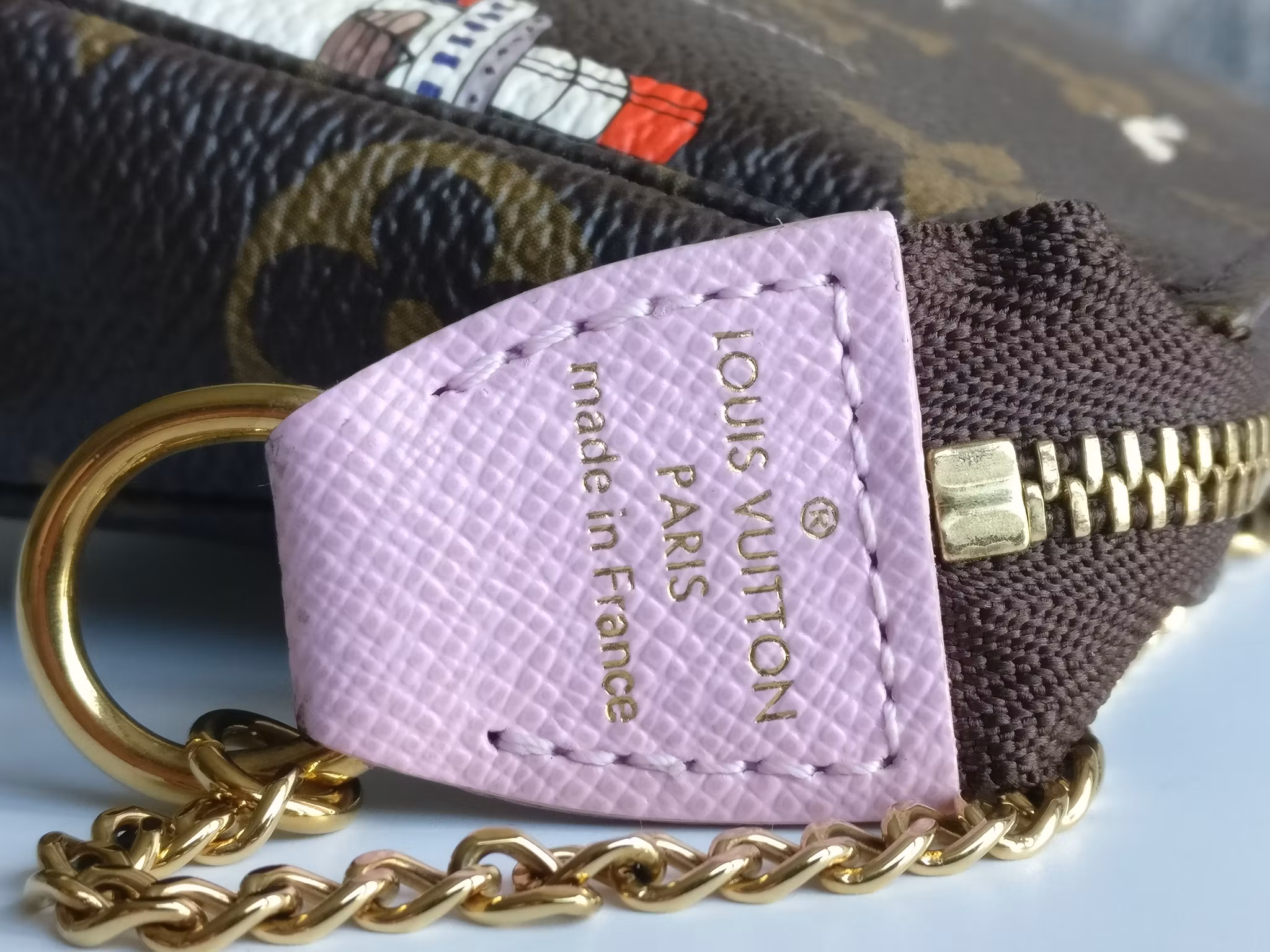 Louis Vuitton Mini Pochette Illustre