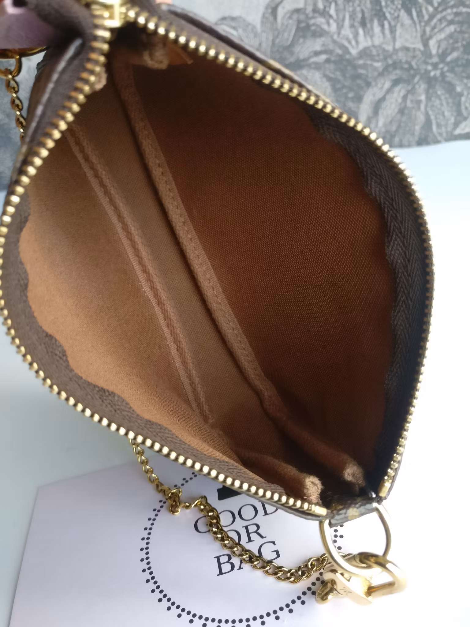 Louis Vuitton Mini Pochette Illustre