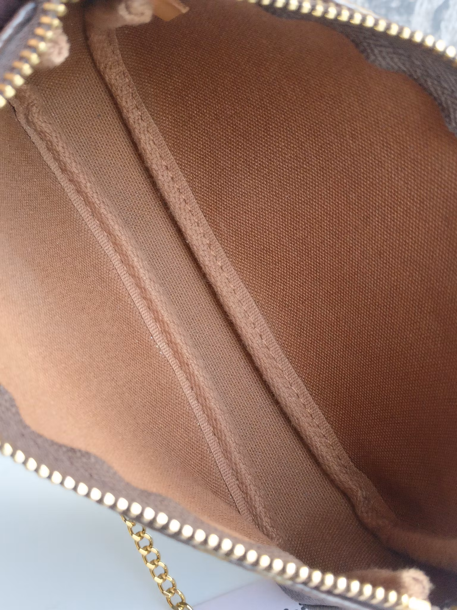 Louis Vuitton Mini Pochette Illustre