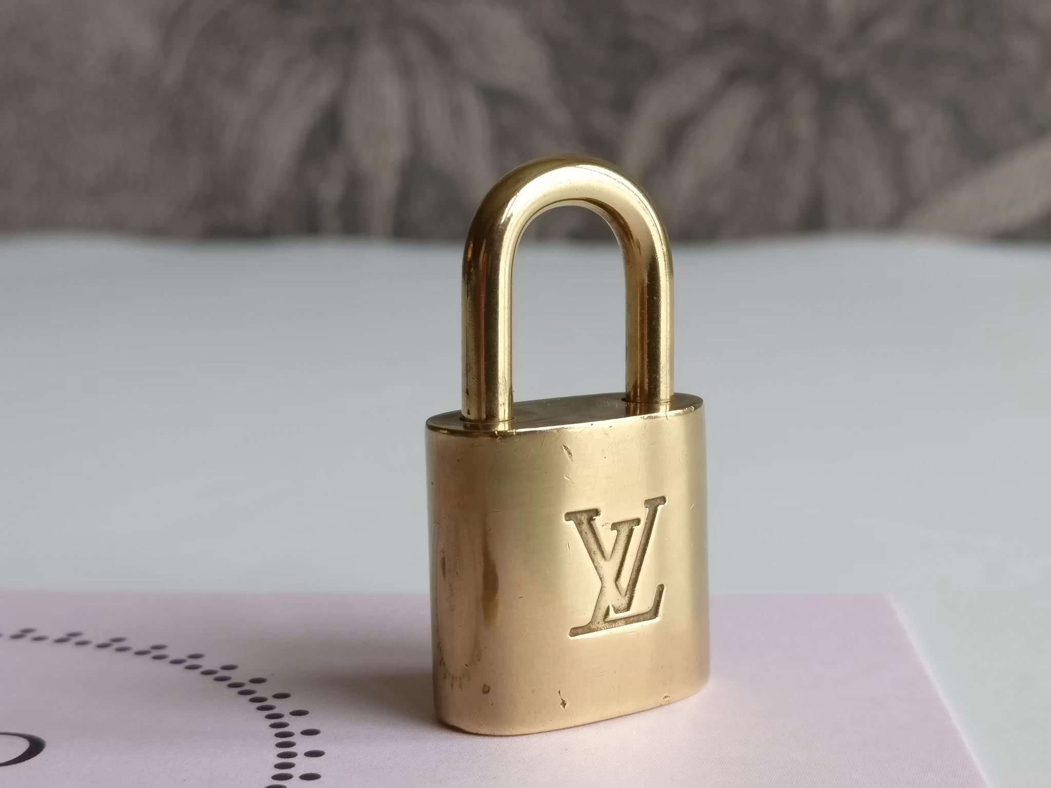 Louis Vuitton padlock with key 319