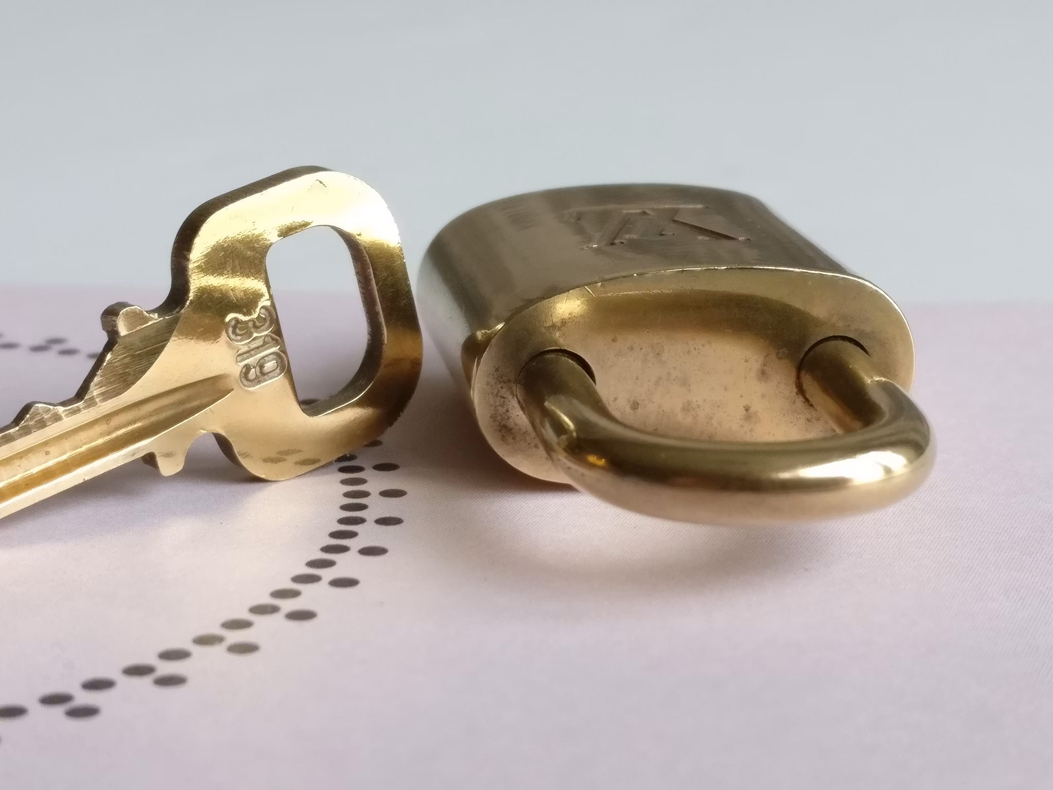 Louis Vuitton padlock with key 319