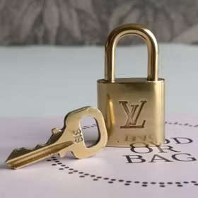 Louis Vuitton padlock with key 319