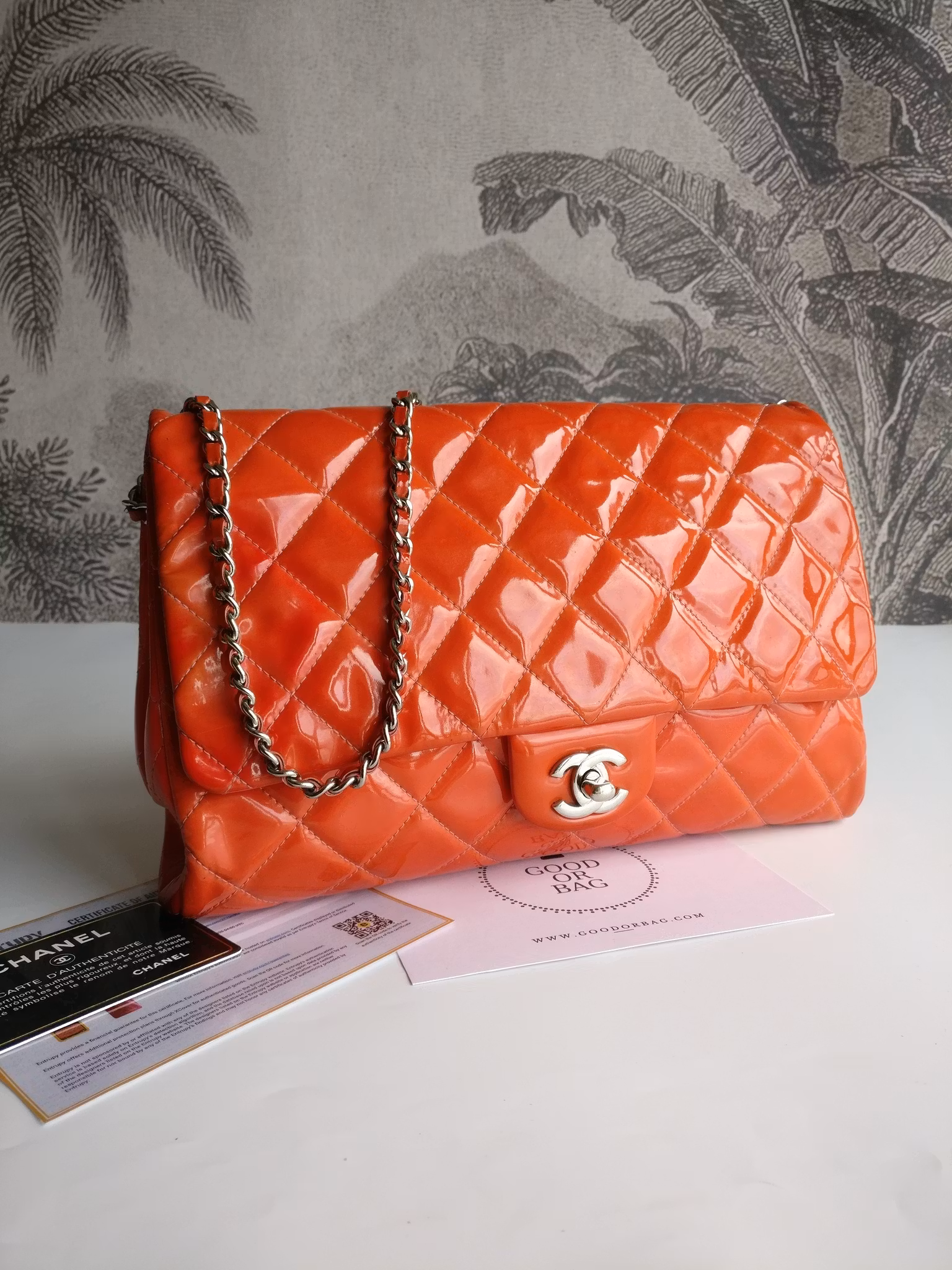 Chanel quilted red patent flap bag