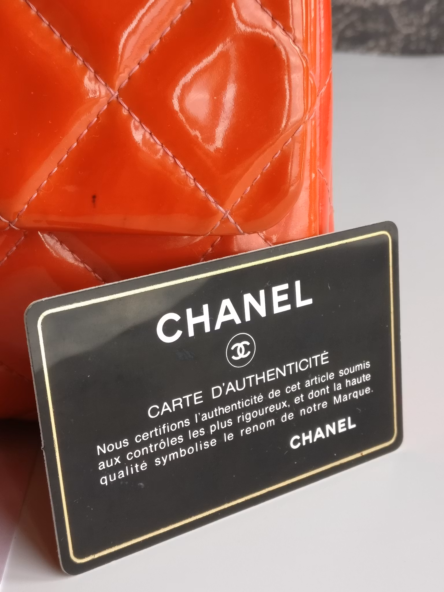 Chanel quilted red patent flap bag