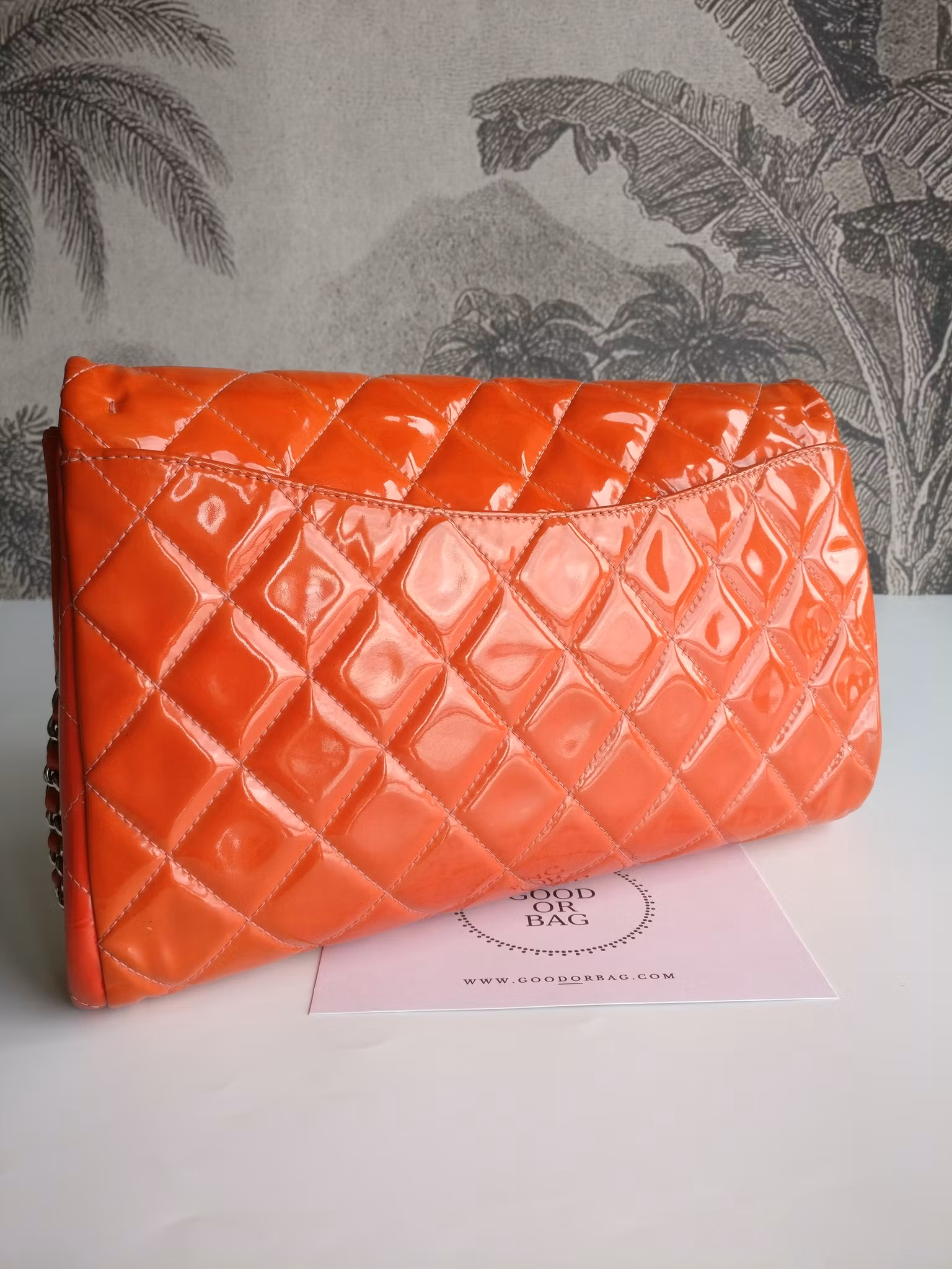 Chanel quilted red patent flap bag