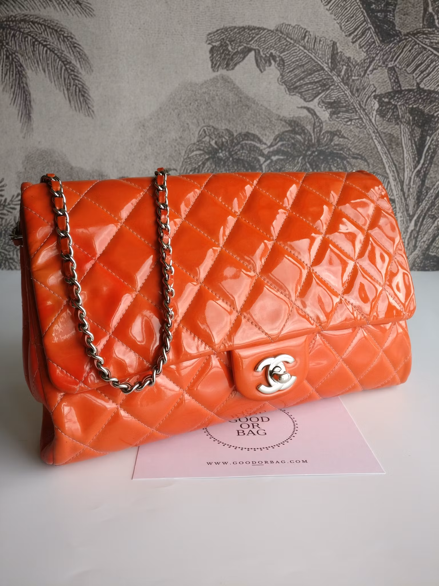 Chanel quilted red patent flap bag