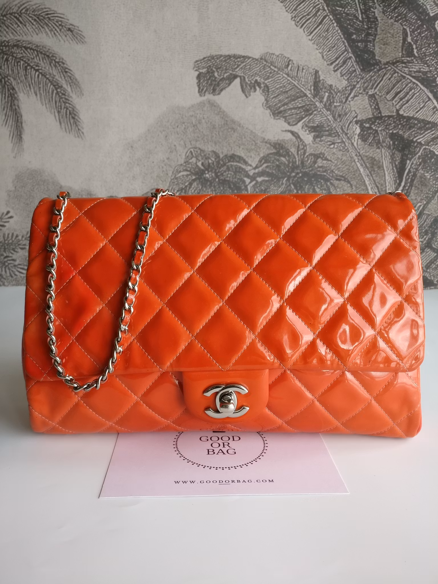 Chanel quilted red patent flap bag