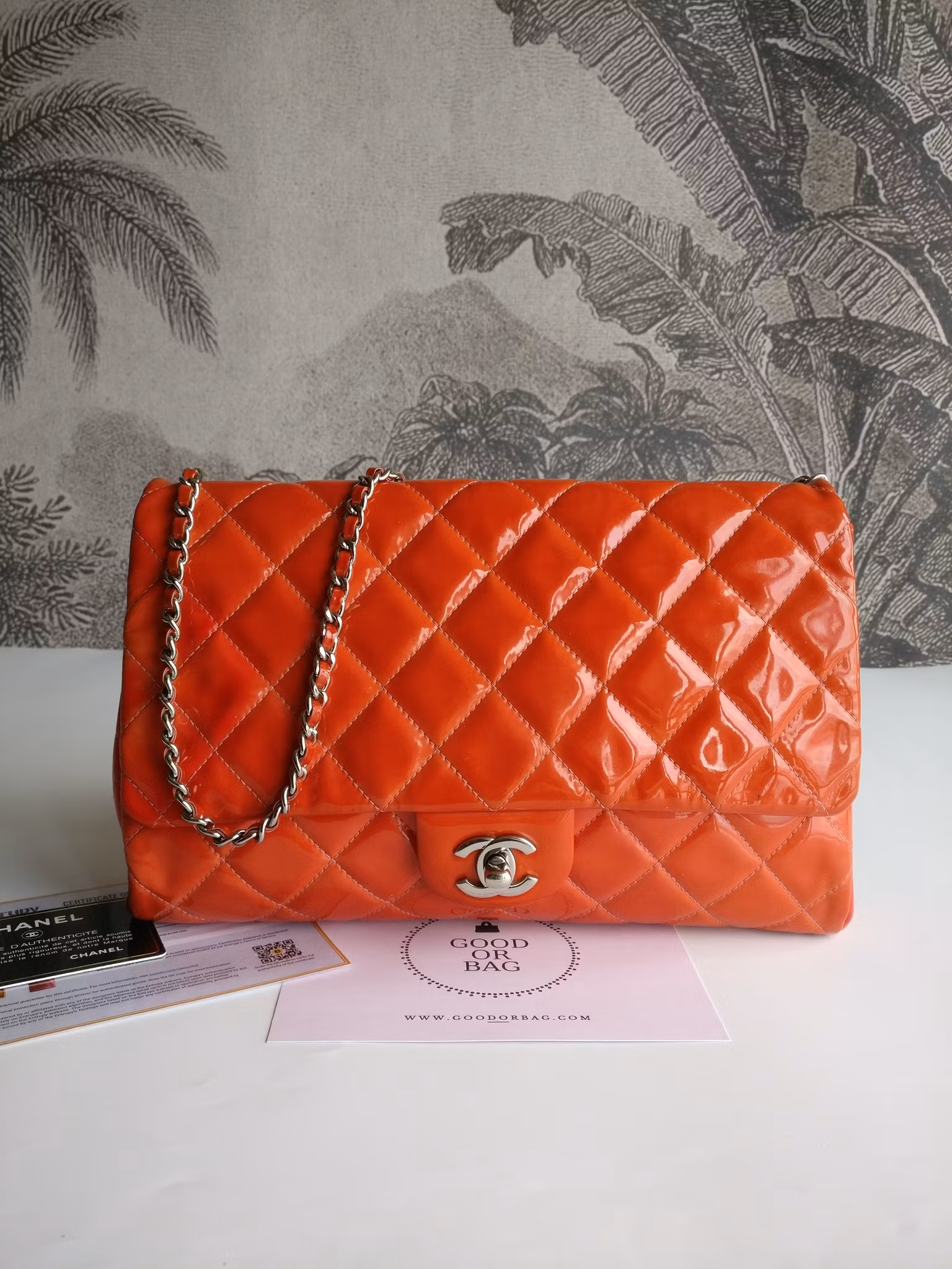 Chanel quilted red patent flap bag