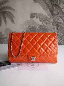 Chanel quilted red patent flap bag