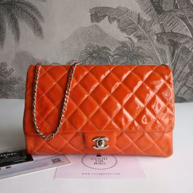 Chanel quilted red patent flap bag