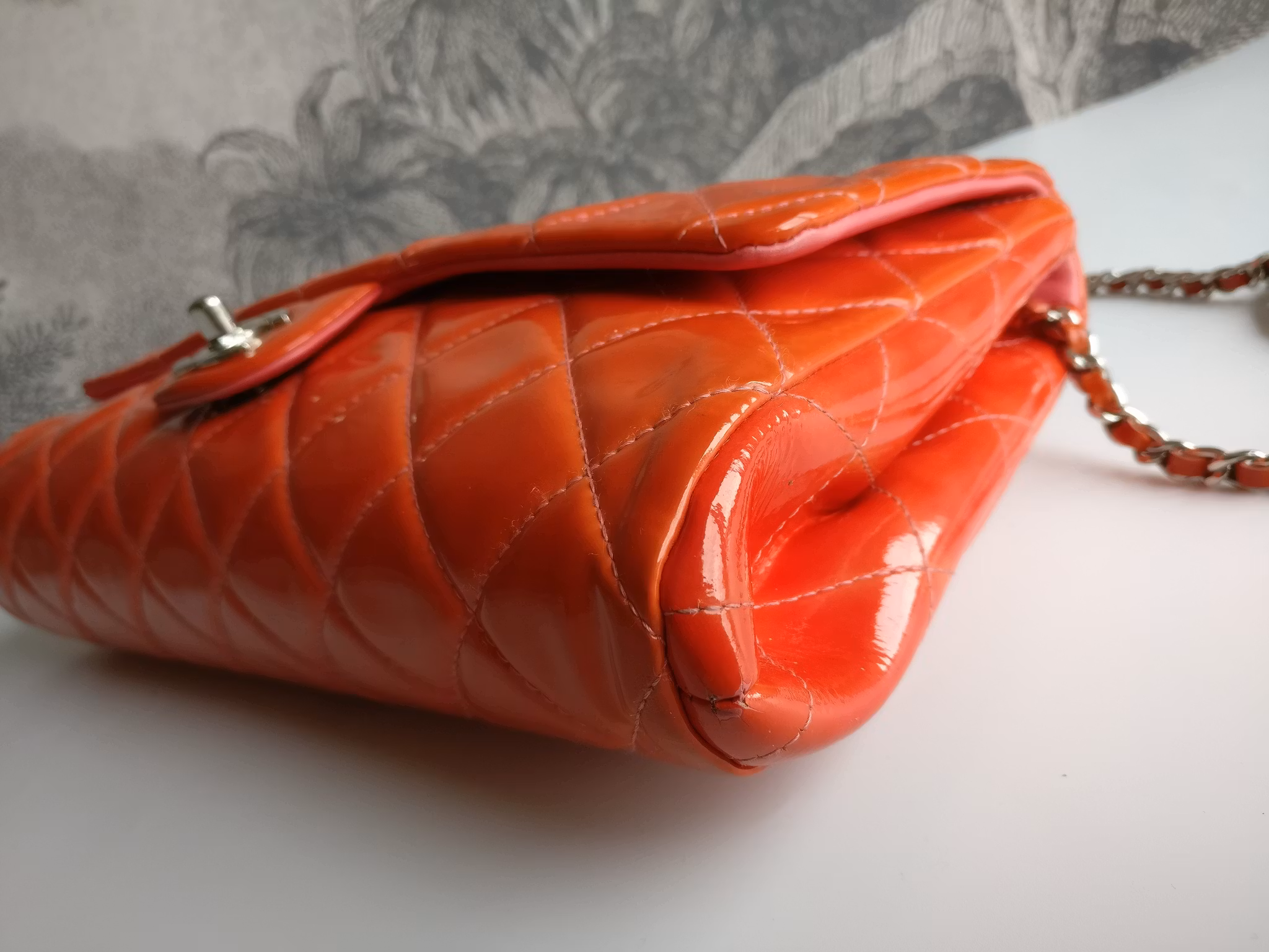 Chanel quilted red patent flap bag