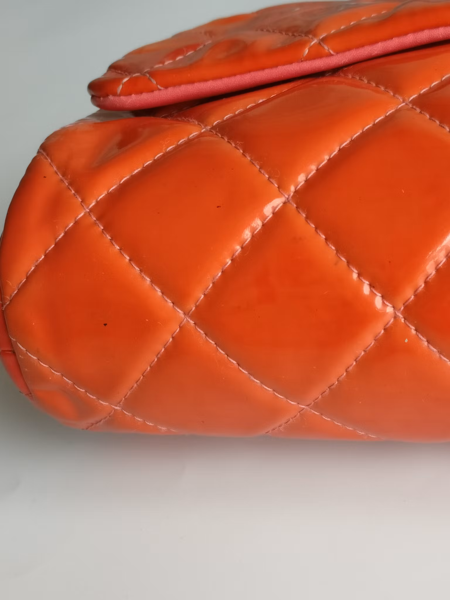 Chanel quilted red patent flap bag