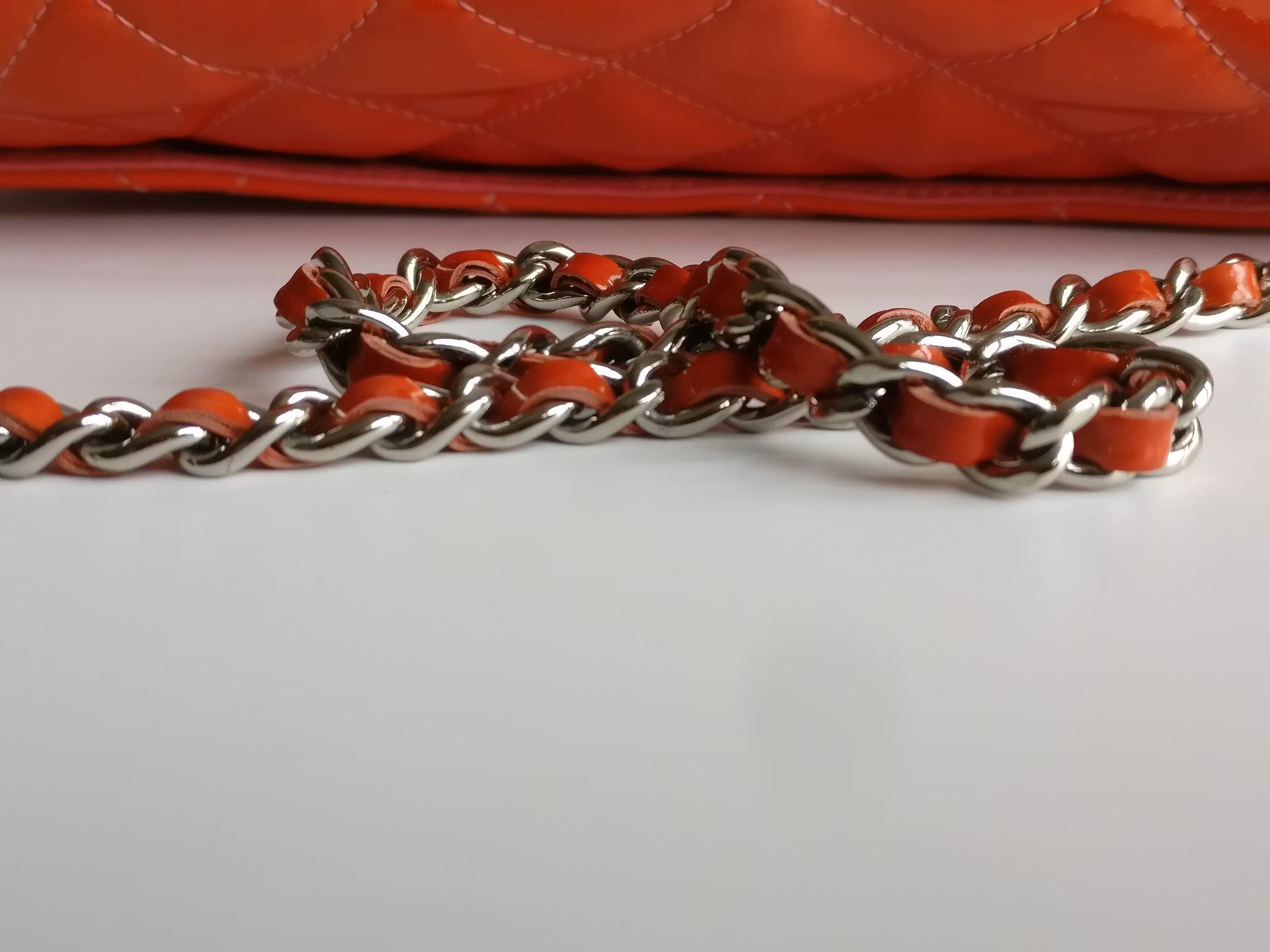 Chanel quilted red patent flap bag