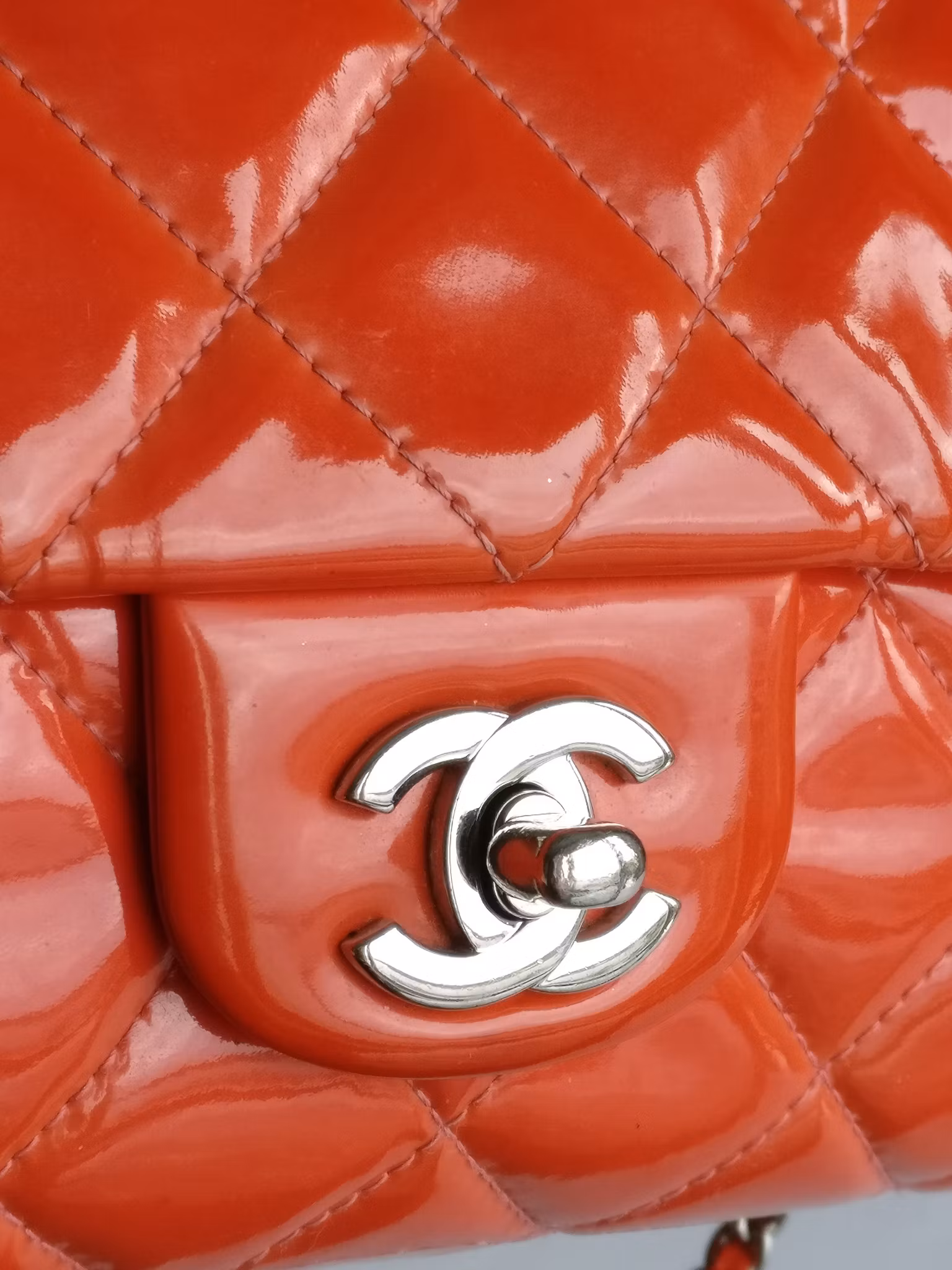 Chanel quilted red patent flap bag