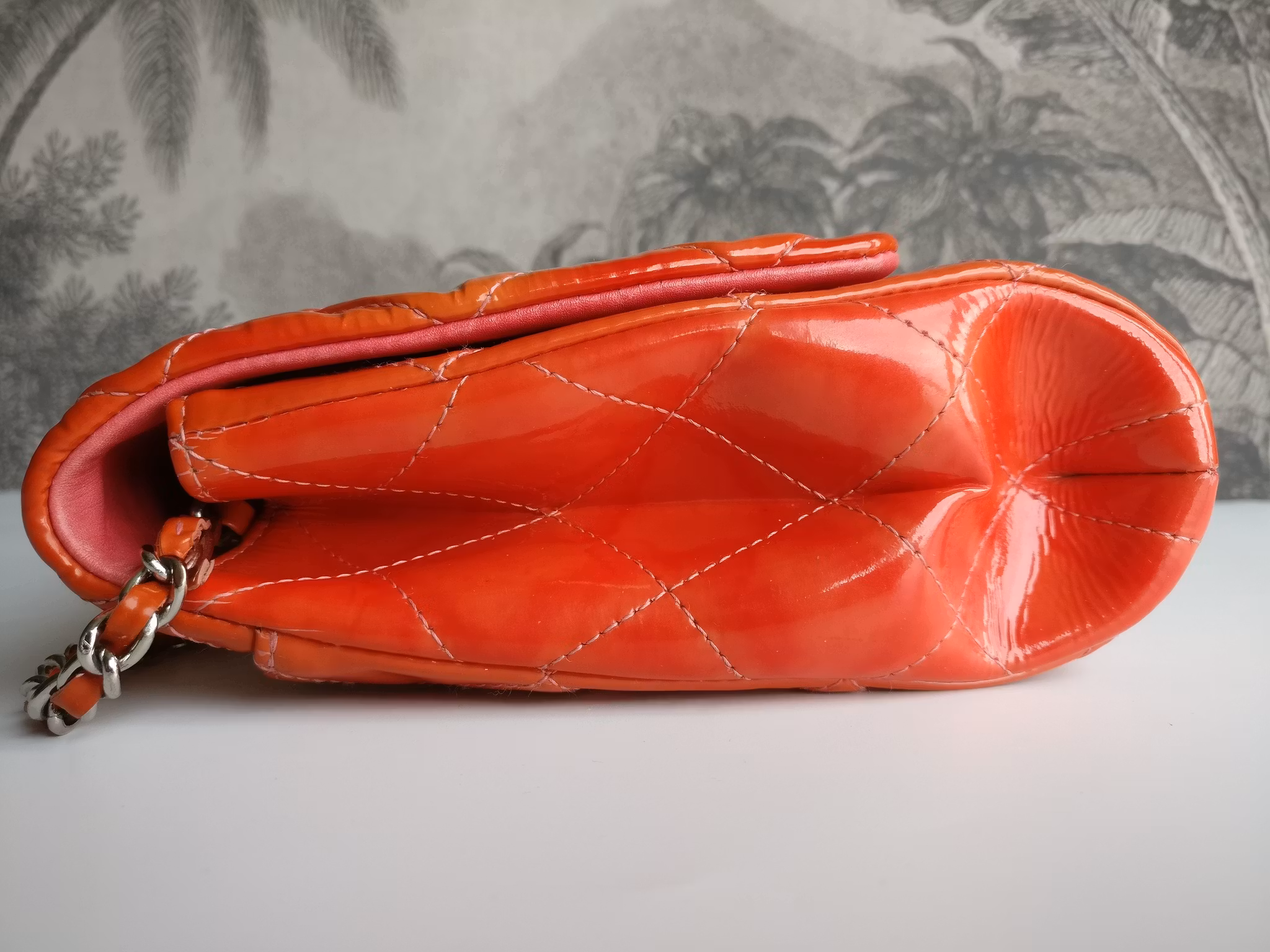 Chanel quilted red patent flap bag