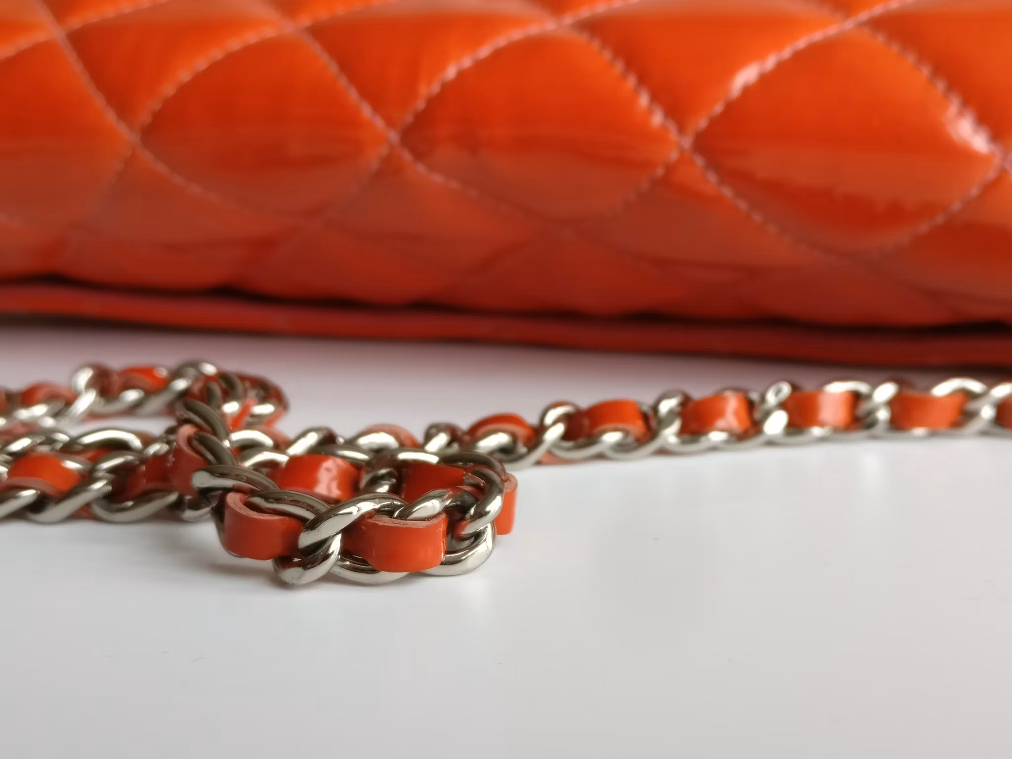 Chanel quilted red patent flap bag