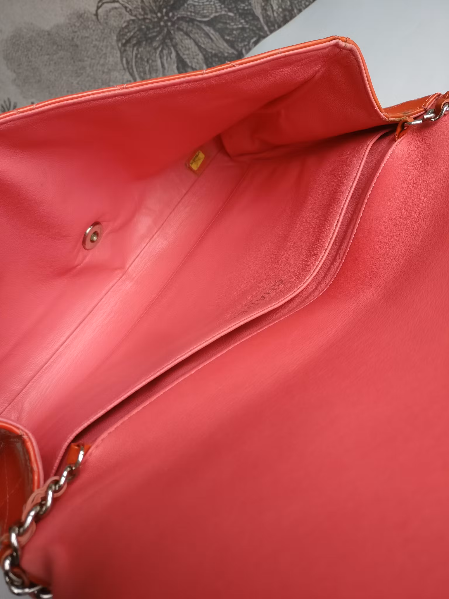Chanel quilted red patent flap bag