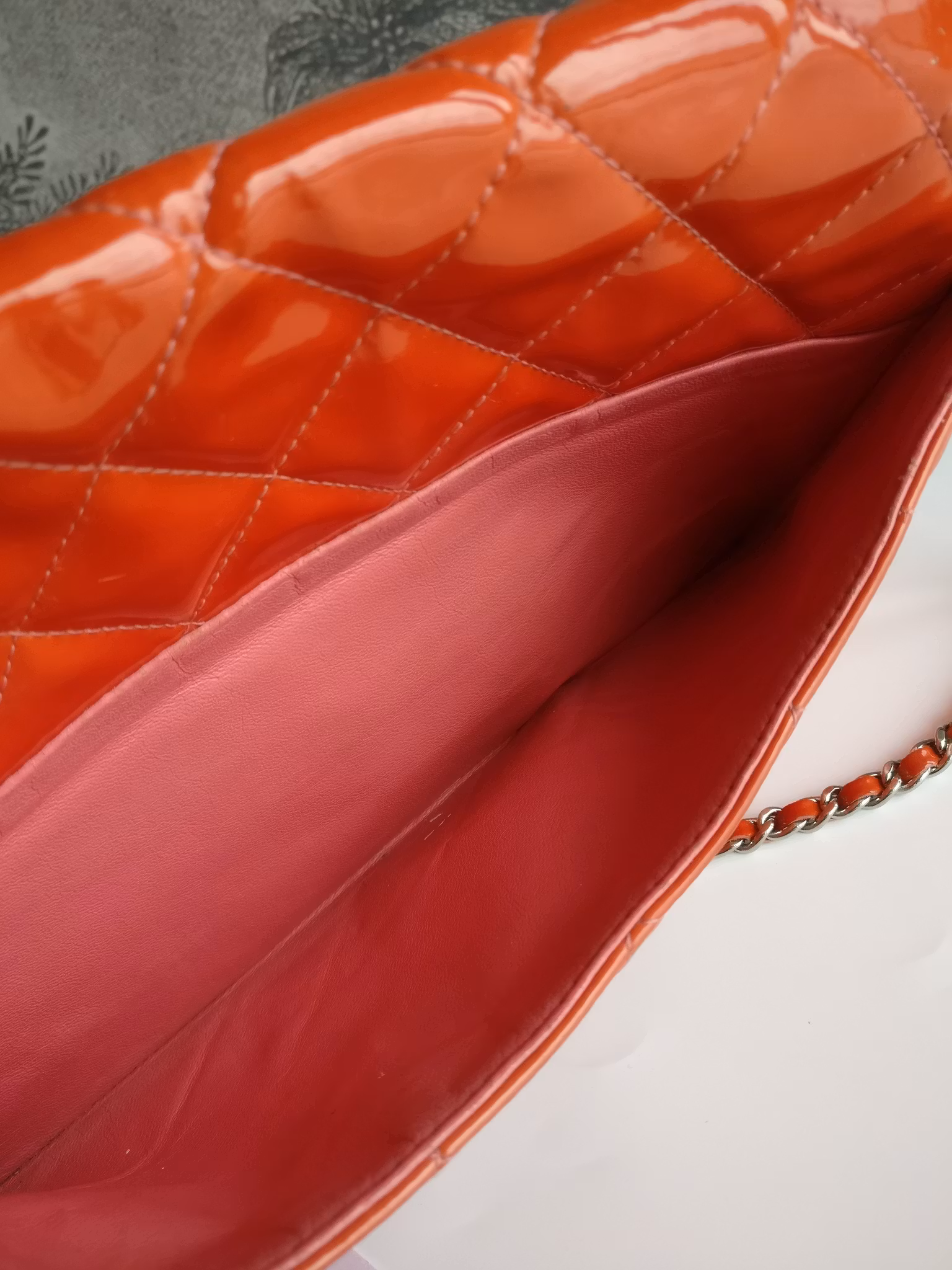 Chanel quilted red patent flap bag