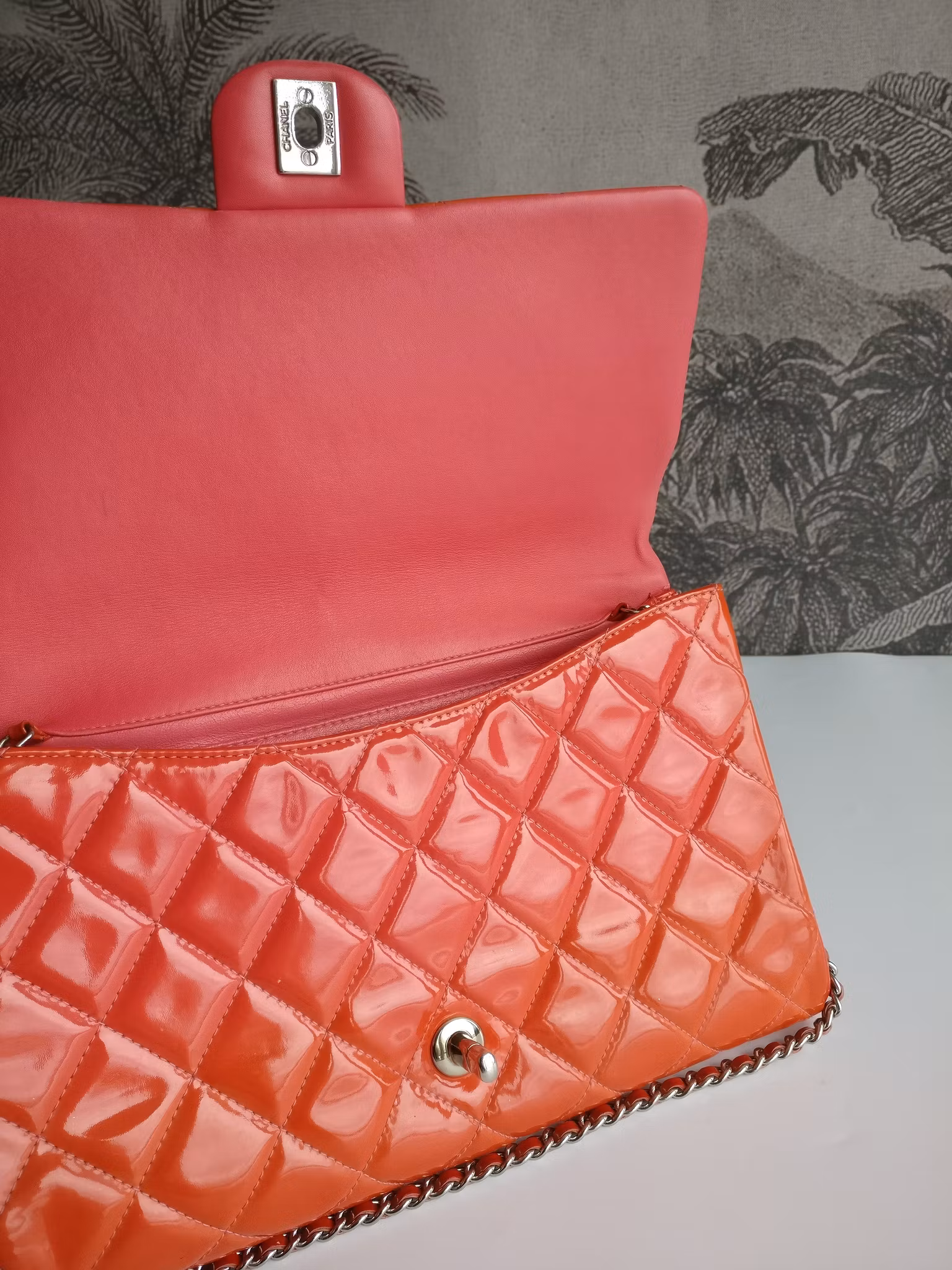 Chanel quilted red patent flap bag