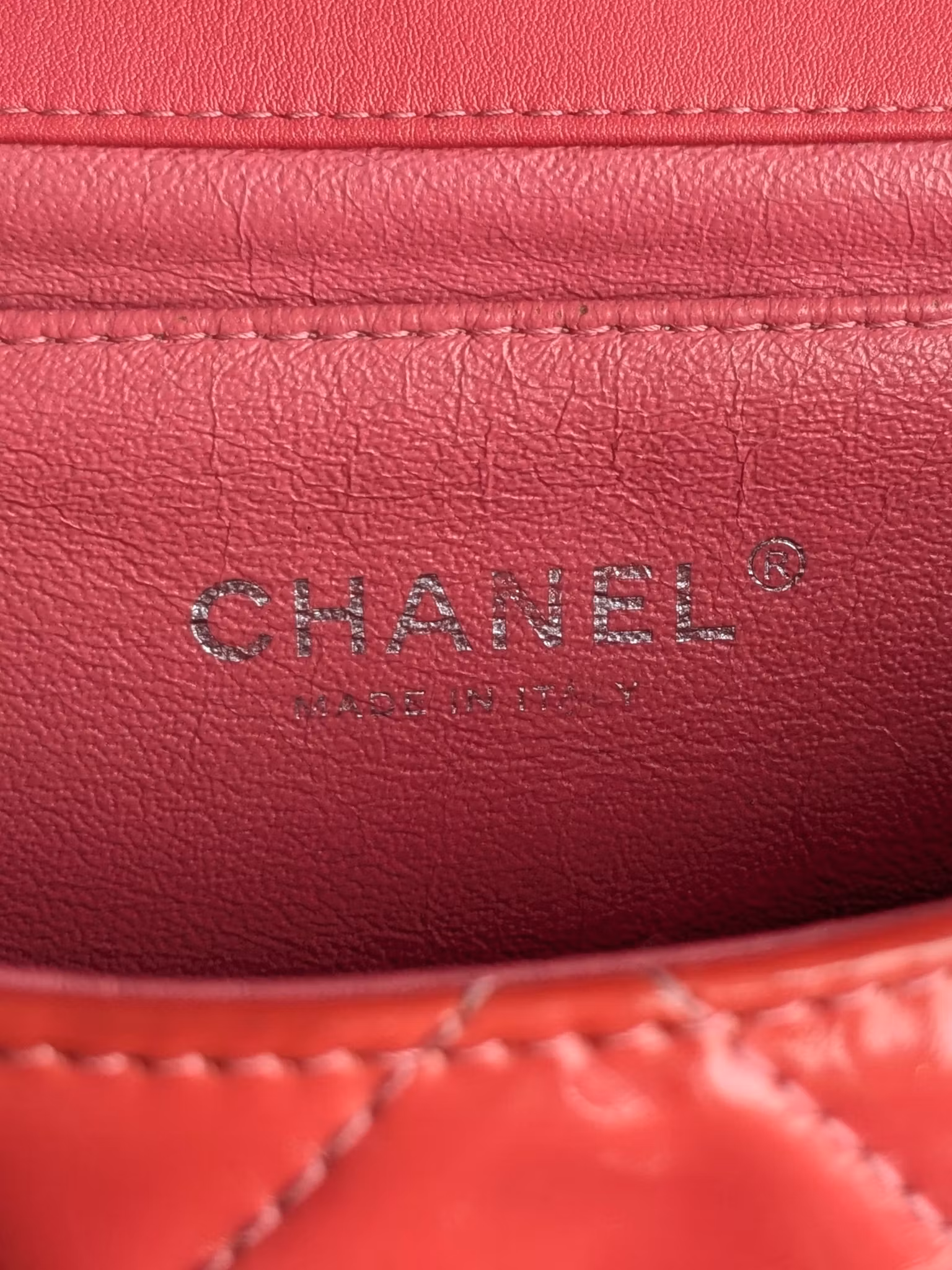 Chanel quilted red patent flap bag