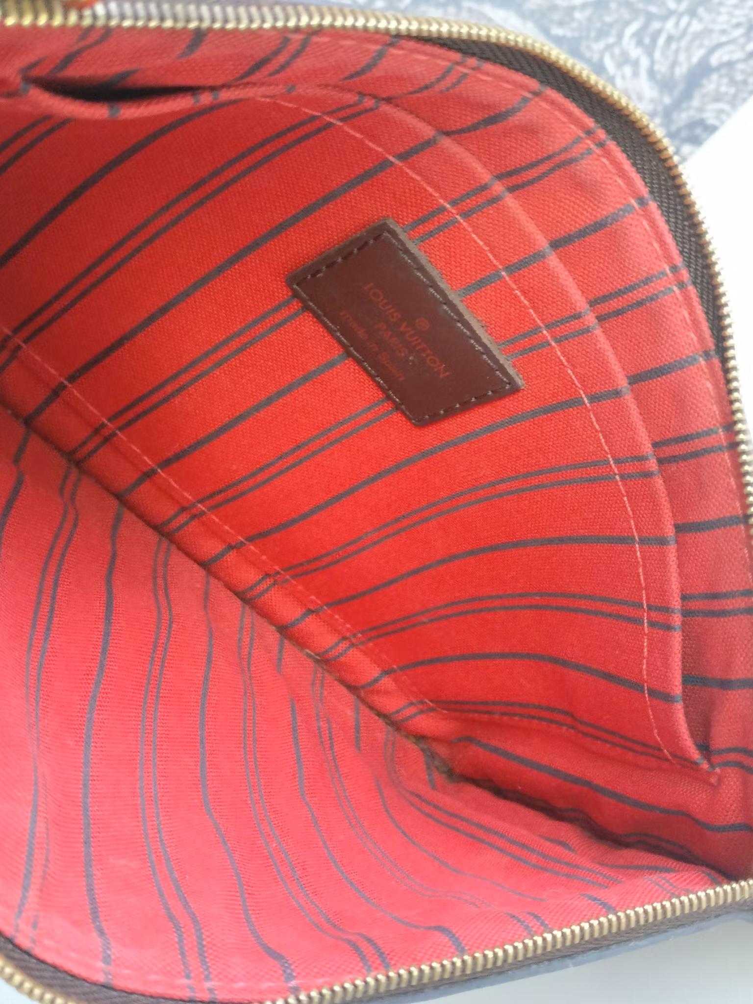 Louis Vuitton Neverfull MM clutch