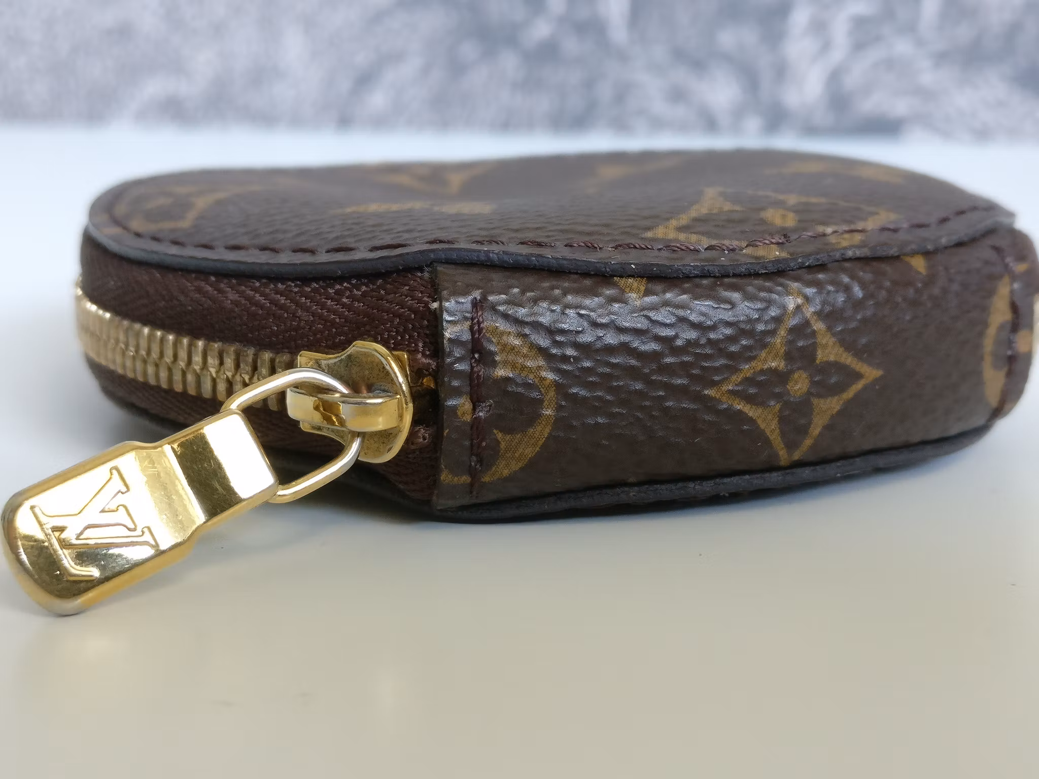 Louis Vuitton Round coin purse