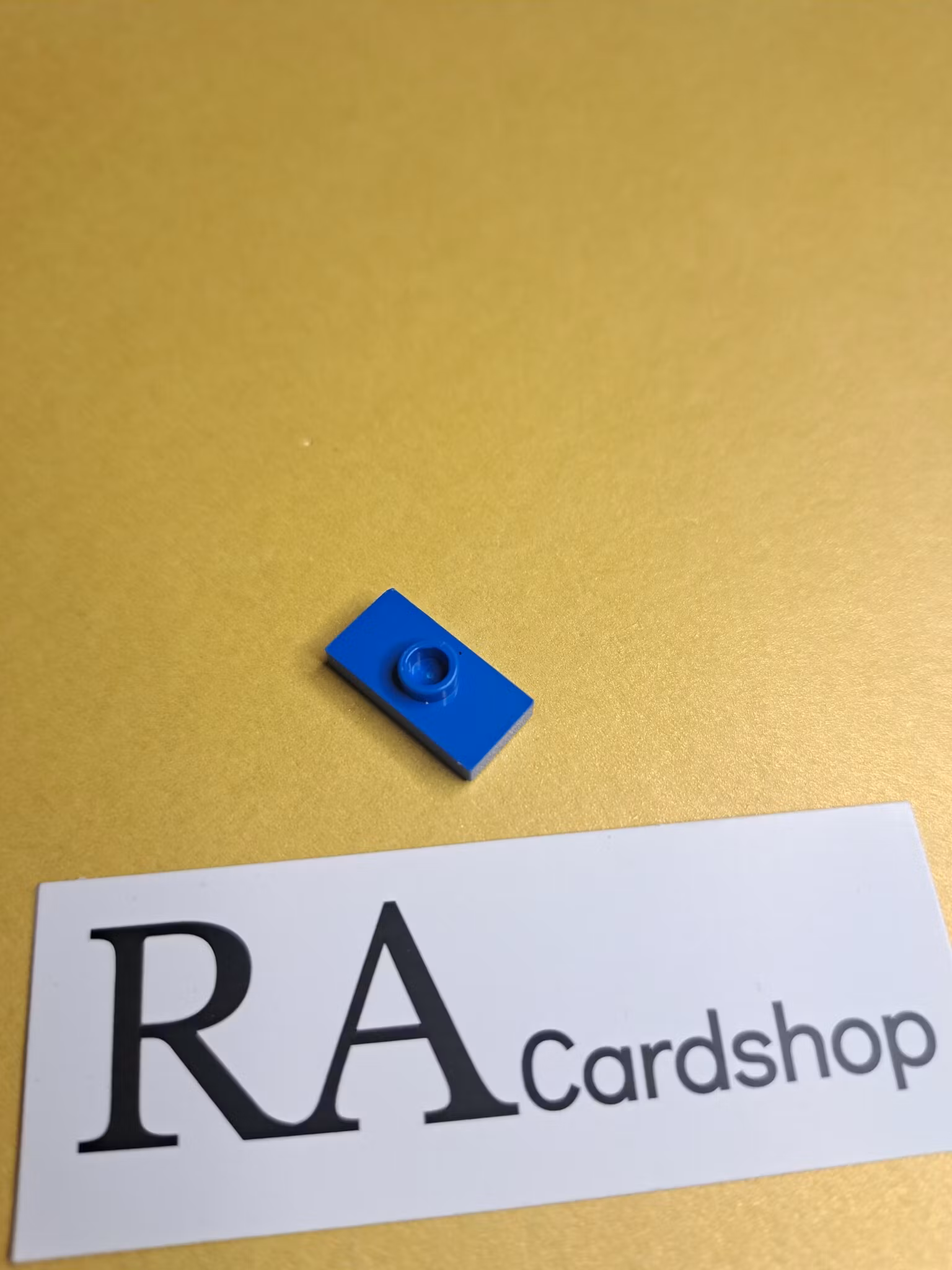 15573 Plate, Modified 1 x 2 with 1 Stud with Groove and Bottom Stud Holder (Jumper) Blue Lego