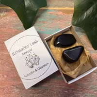 Kristaller i ask - Beskydd