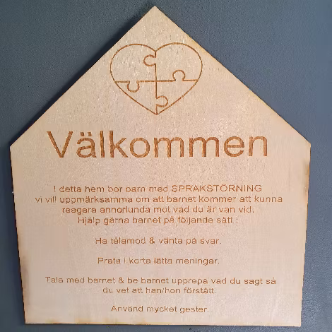 Npfskylt Välkommen