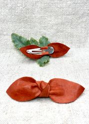 Röd läderrosett-spänne, liten