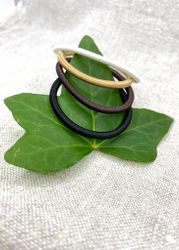 Antikguldig läderrosett-gummiband